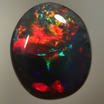 SOLID BLACK OPAL Bright, rich cherry red rolling flashes